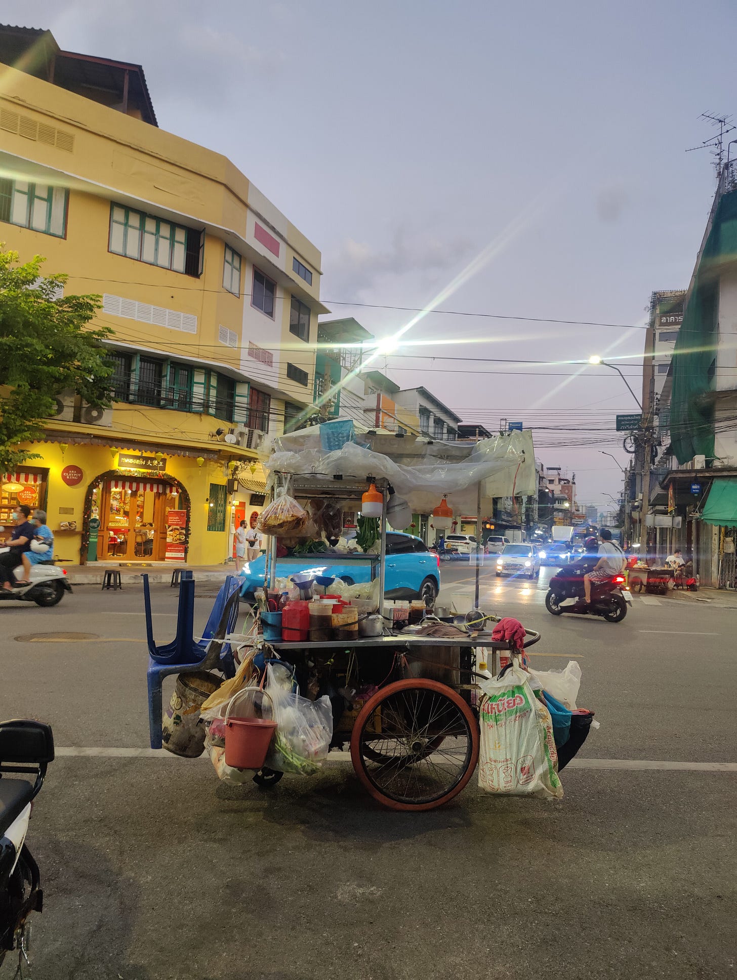 a street vendor stands alone