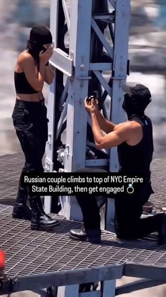 A Russian couple's dramatic marriage proposal atop New York City's iconic Empire  State Building has captured hearts across the world. With breathtaking  views and an unforgettable surprise, this magical moment has gone