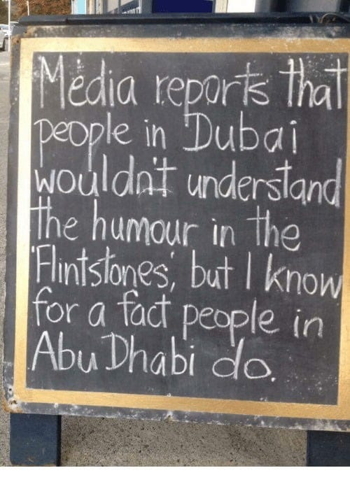 May be a meme of signboard and text that says 'Média reports that people in Dubai wouldn't understand The humour in the 'Flintstones, but I know for a fact people in Abu Dhabi do.'