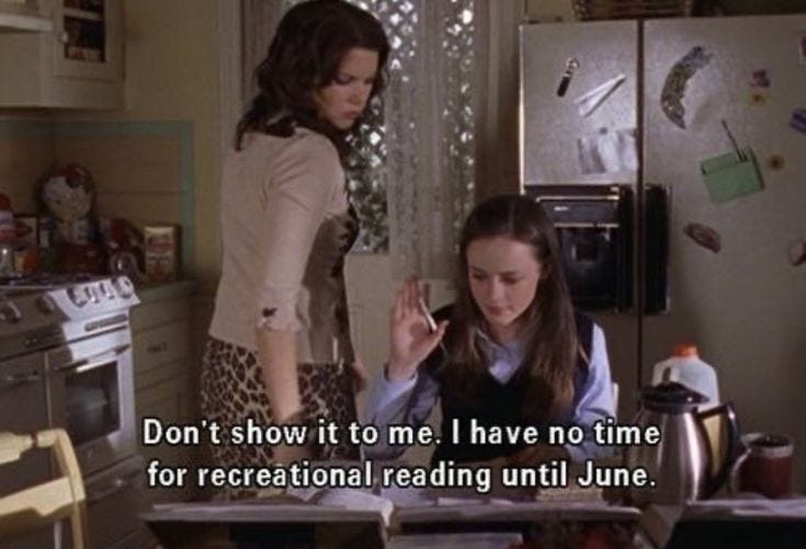 This may contain: two women standing in a kitchen talking to each other with the caption don't show it to me i have no time for recreational reading until june