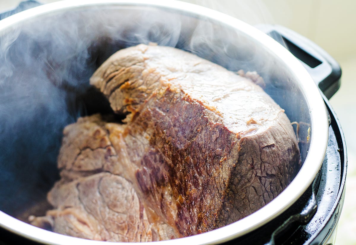 Beef roast searing in Instant Pot. Beef roast searing in Instant Pot.