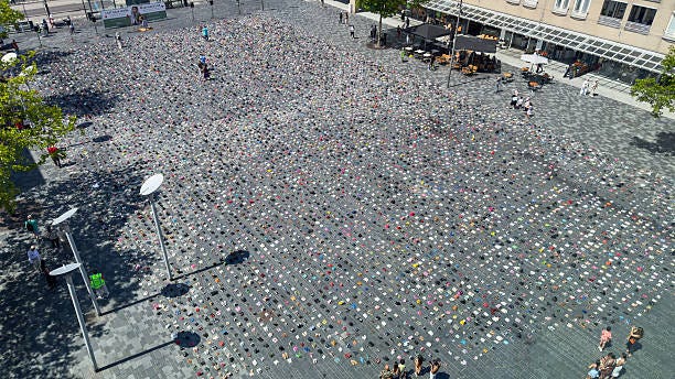 Thousands of children's shoes filled Almere's city square, symbolizing the lives of Palestinian children killed in Gaza on June 29, 2025 in Almere,...