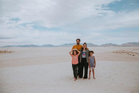Whitesands National Park, an old saloon/opera house, pink architecture, cowboys eating pie in a cafe, Petroglyph on a boulder