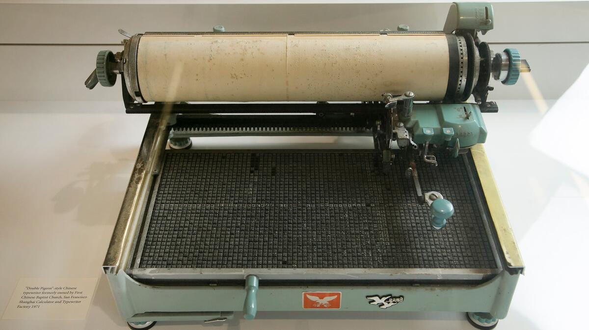 The Chinese-manufactured Double Pigeon typewriter from 1971 became the standard for Chinese typewriters. It featured a moveable tray holding nearly 2,500 interchangeable characters. The Chinese-manufactured Double Pigeon typewriter from 1971 became the standard for Chinese typewriters. It featured a moveable tray holding nearly 2,500 interchangeable characters.