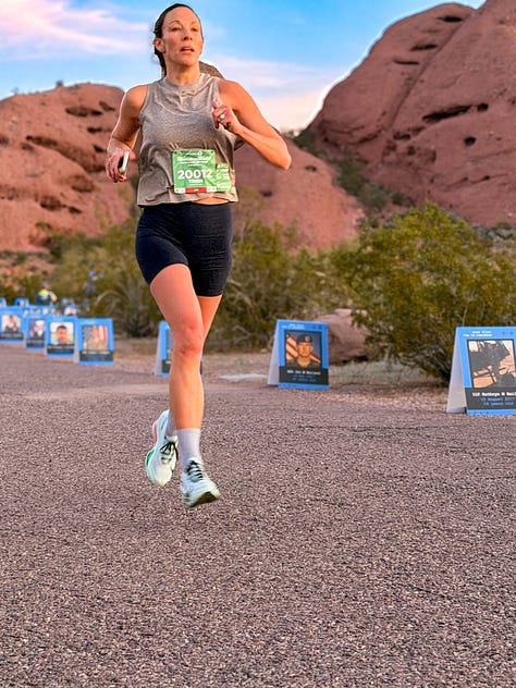 Two women, mothers of fallen soldiers, stand side-by side, holding American flags that represent their fallen sons. An image gallery from that morning shows pictures of fallen soldiers, runners along the Papago Park trail and a beautiful desert morning.
