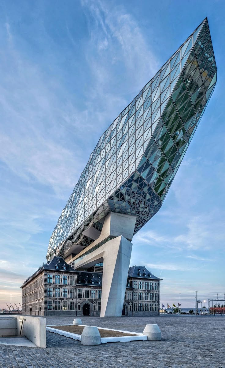 This may contain: a large building with a very unusual design on it's side