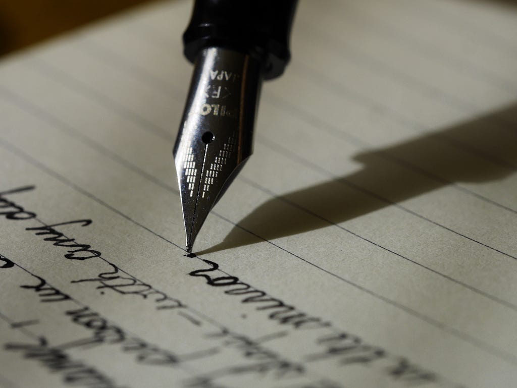 pen writing on paper pen writing on paper