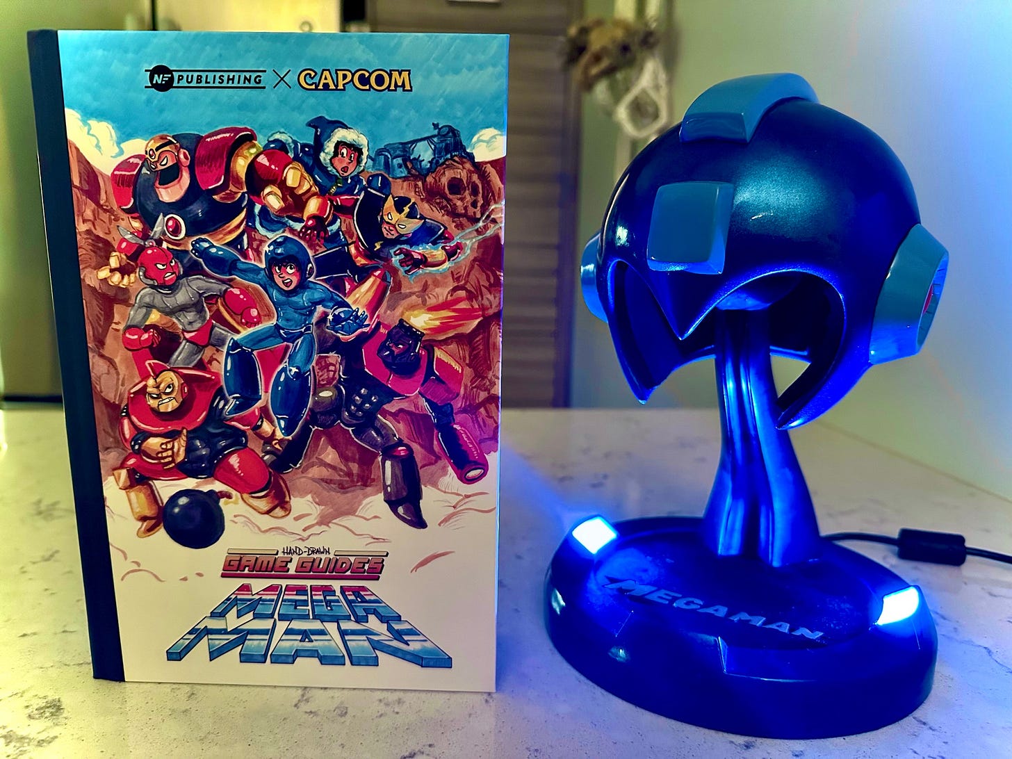 The cover of the Hand-Drawn Game Guides Mega Man