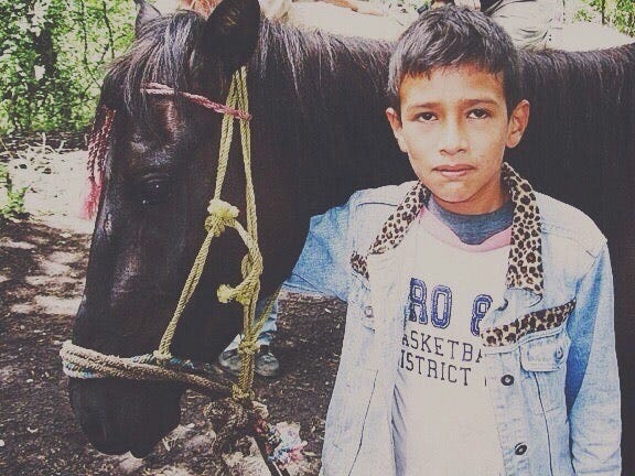 4 photos of Antigua, climbing a volcano outside the city and visiting Chichicastenango.