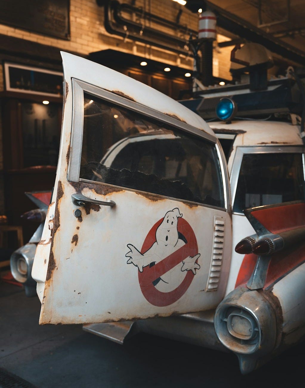 a small truck parked on the side of a building