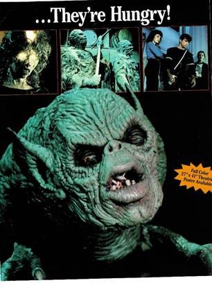 A green creature with a few images of people

AI-generated content may be incorrect.