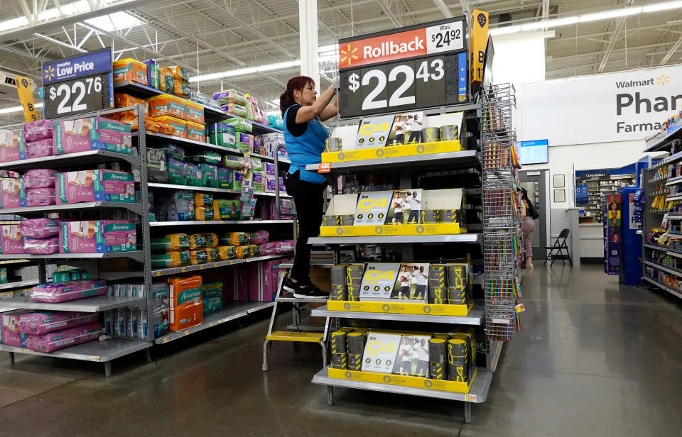 MIAMI, FLORIDA - JANUARY 24: A worker stocks the shelves at a Walmart store on January 24, 2023 in Miami, Florida. Walmart
announced that it is raising its minimum wage for store employees in early March, store employees will make between $14 and $19 an hour. They currently earn between $12 and $18 an hour. (Photo by Joe Raedle/Getty Images) MIAMI, FLORIDA - JANUARY 24: A worker stocks the shelves at a Walmart store on January 24, 2023 in Miami, Florida. Walmart
announced that it is raising its minimum wage for store employees in early March, store employees will make between $14 and $19 an hour. They currently earn between $12 and $18 an hour. (Photo by Joe Raedle/Getty Images)