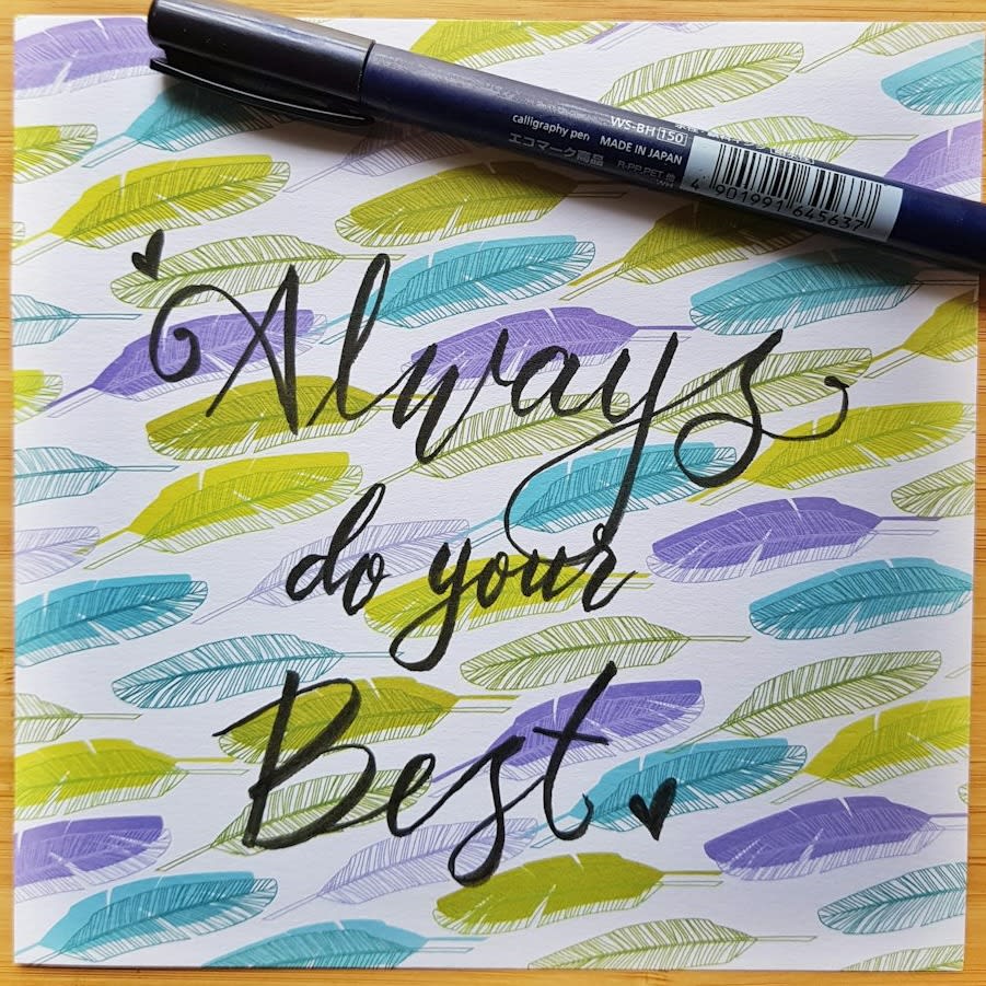 black pen on brown wooden table