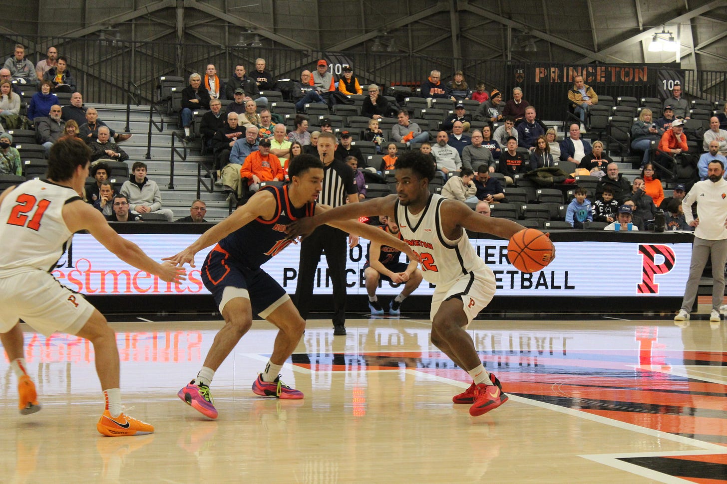 Dalen Davis (22) drives with the ball during Princeton’s win over Bucknell on Nov. 11, 2025. (Photo by Adam Zielonka)
