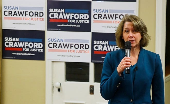 Circuit court Judge Susan Crawford campaigns for the Wisconsin Supreme Court election in Janesville on March 24, 2025. The liberal is running against conservative Waukesha County Judge Brad Schimel in the election taking place April 1, 2025.