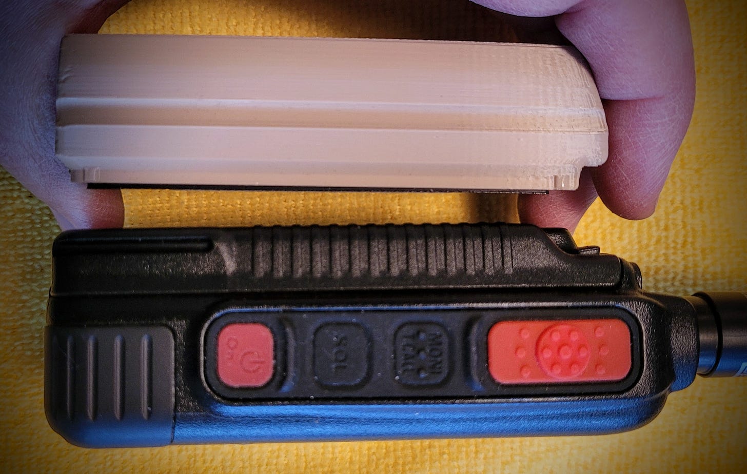 W0AEZ battery thickness compared to the stock battery