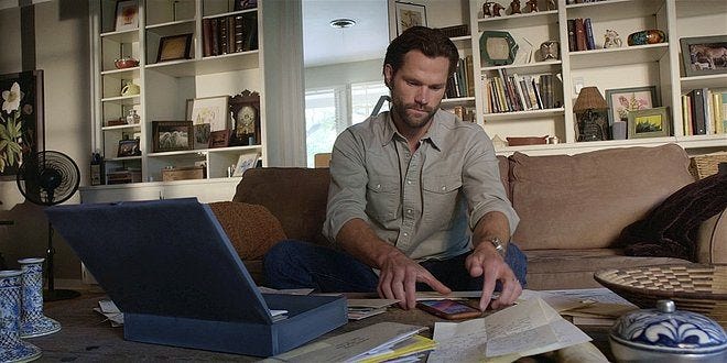 Walker Cordell digging through Mickis mothers belongings. Walker Cordell digging through Mickis mothers belongings.