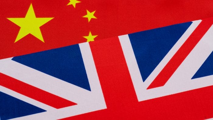 UK and Chinese national flags together.