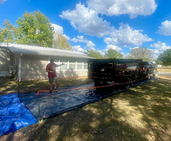 Photos of the rock delivery and helping hands spreading it.