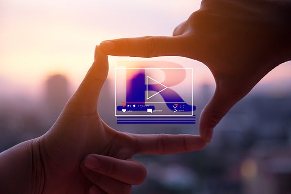 fingers shaping into heart with a play button and Ruminato logo 