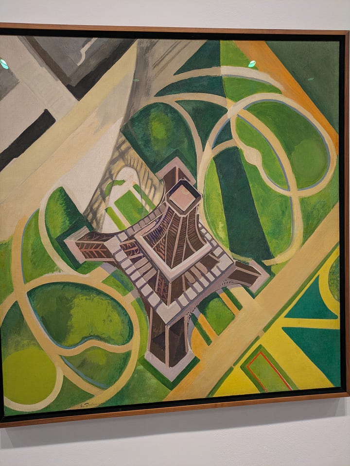 Seated woman, Wilfredo Lam, Cuba 1955. Eiffel Tower and Gardens, Champ de Mars. Robert Delaunay, 1922, Paris.