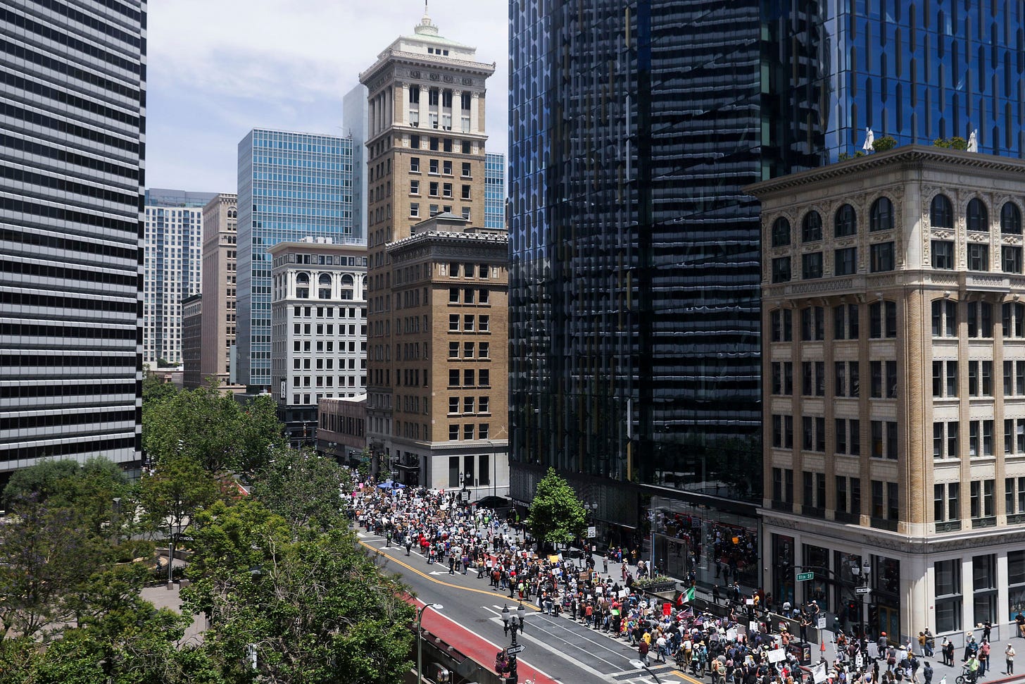 Protesters march through downtown Oakland, California.