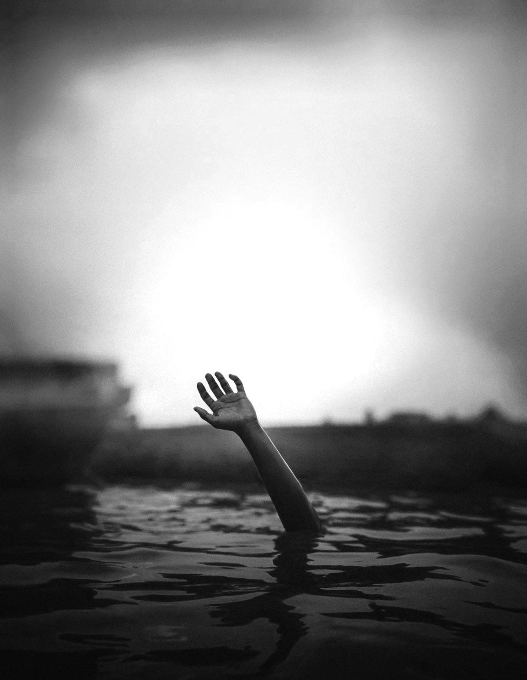 a hand in the water