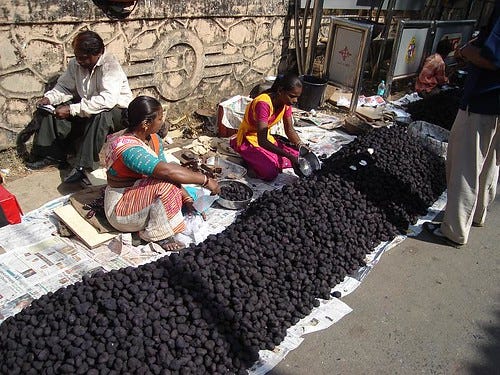 Lady selling Singada Lady selling Singada