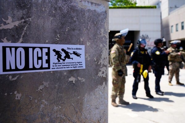 DHS police and National Guard protect the outside the Metropolitan Detention Center, Wednesday, June 11, 2025, in Los Angeles. (AP Photo/Damian Dovarganes) DHS police and National Guard protect the outside the Metropolitan Detention Center, Wednesday, June 11, 2025, in Los Angeles. (AP Photo/Damian Dovarganes)