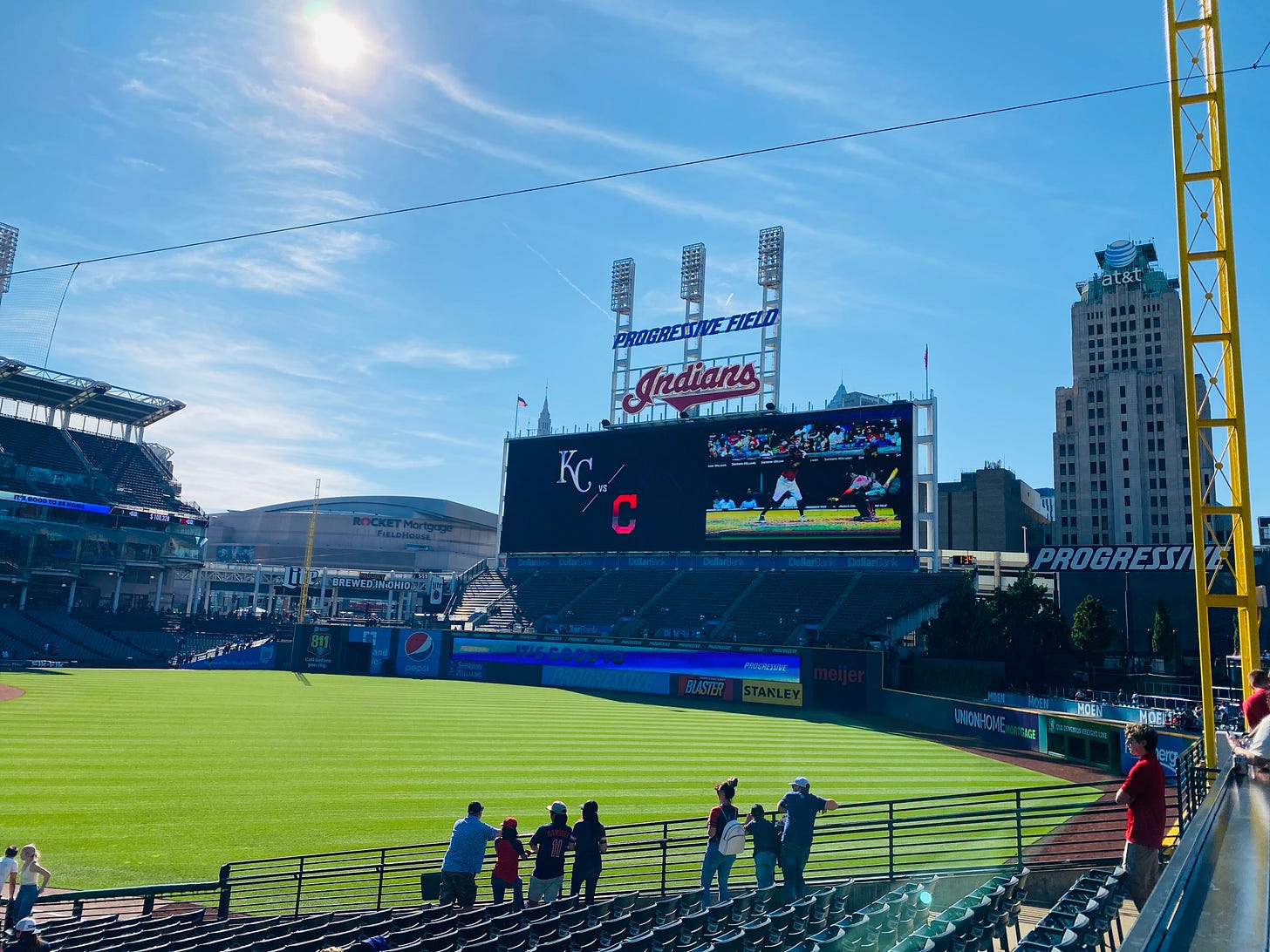 baseball stadium, sign, sky, people