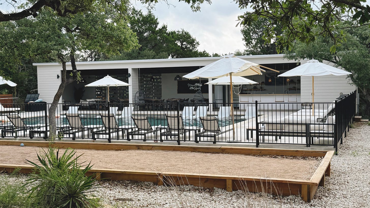 The pool and bocce ball court at The Cedar’s Ranch