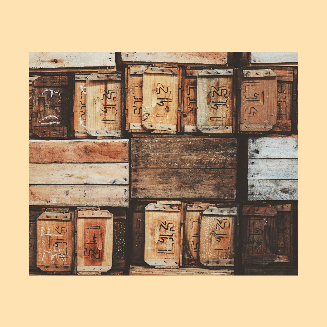 A stack of vintage wooden crates