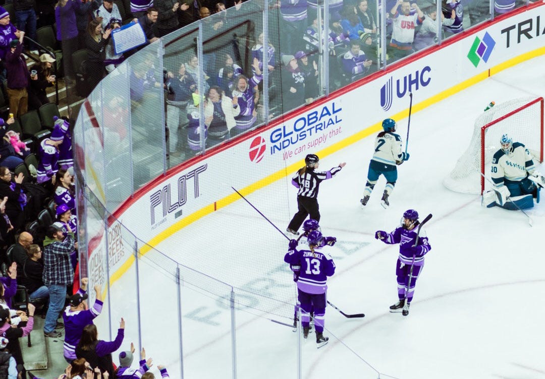 Frost celebrate after scoring against Seattle.