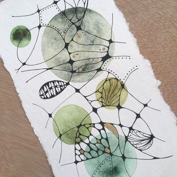 This may contain: a piece of paper that has been drawn on with colored pencils and watercolor paints