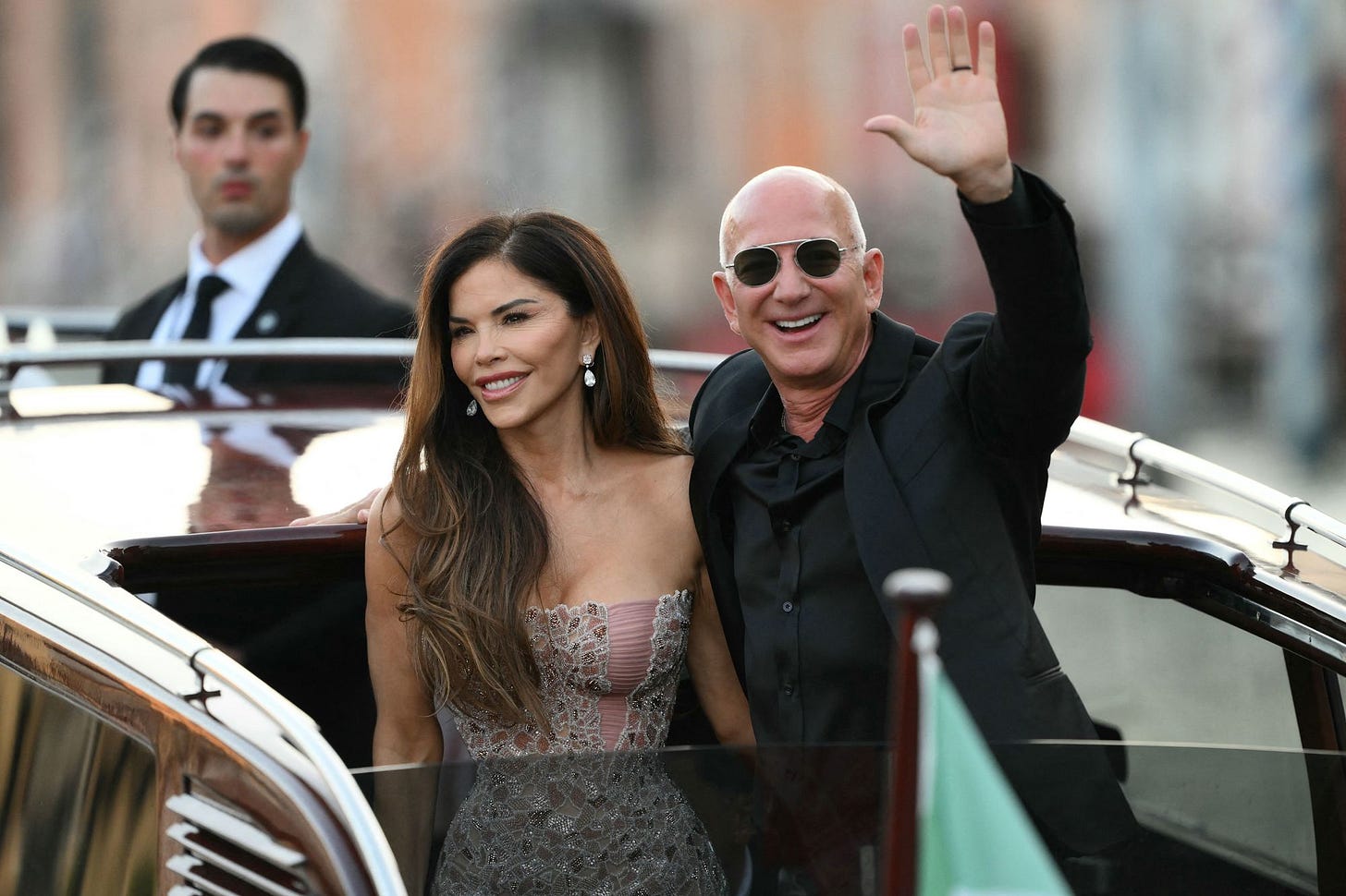 Jeff Bezos and spouse Lauren Sanchez Bezos leave the Aman Hotel on the third day of their wedding festivities in Venice, Italy on June 28, 2025.