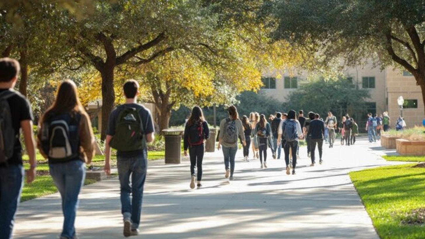 College or university students walking to class with backpacks on a fall day College or university students walking to class with backpacks on a fall day