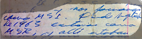 A close up of a piece of paper with blue writing

Description automatically generated