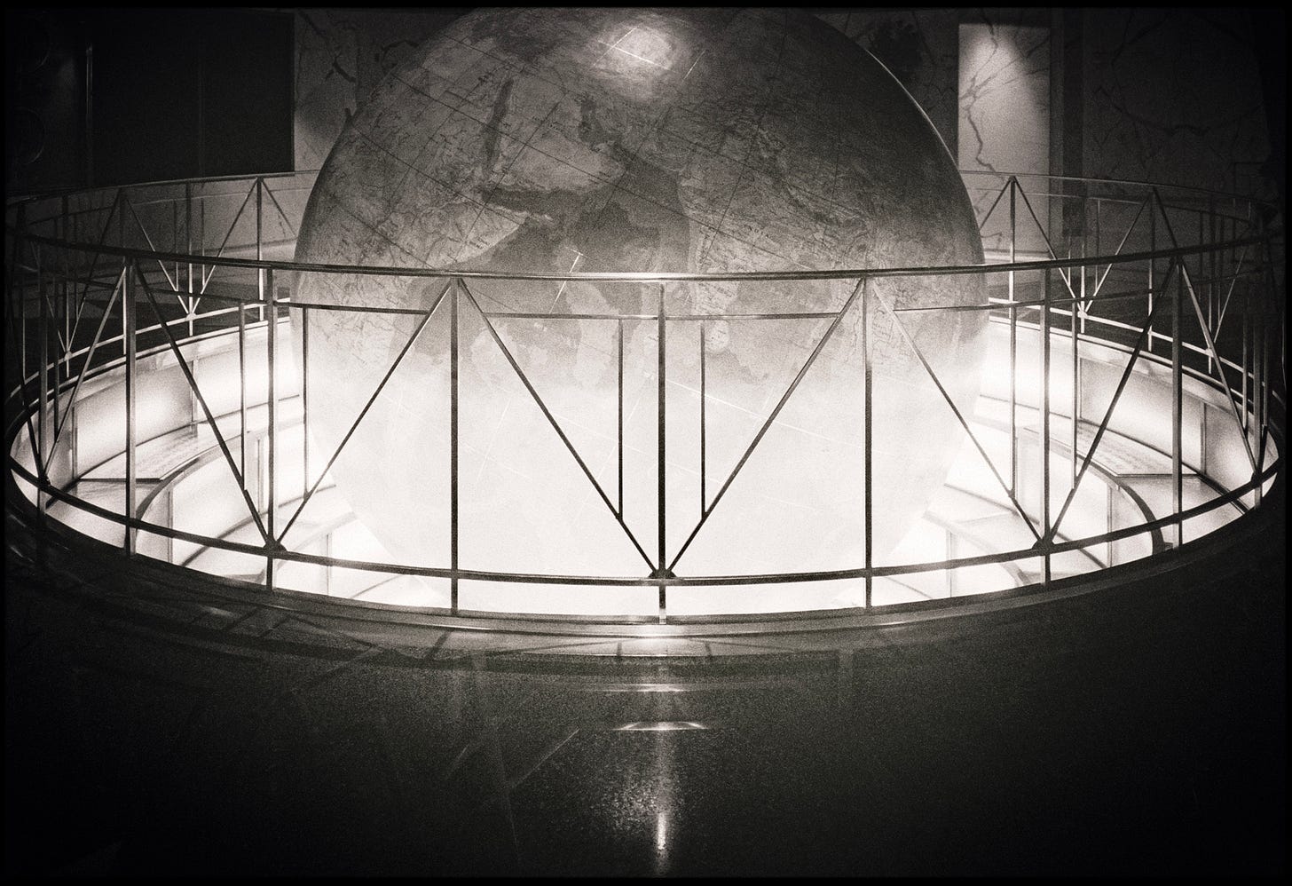 The Daily News Building globe and Art Deco lobby, New York. From the series Gotham by Sean Perry.