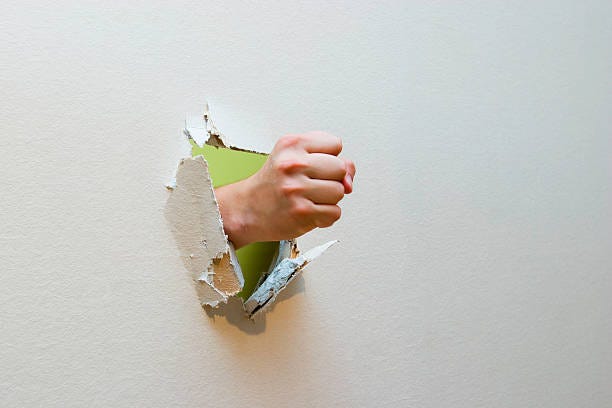 1,000+ Hand Punching Through Wall Stock Photos, Pictures & Royalty-Free  Images - iStock
