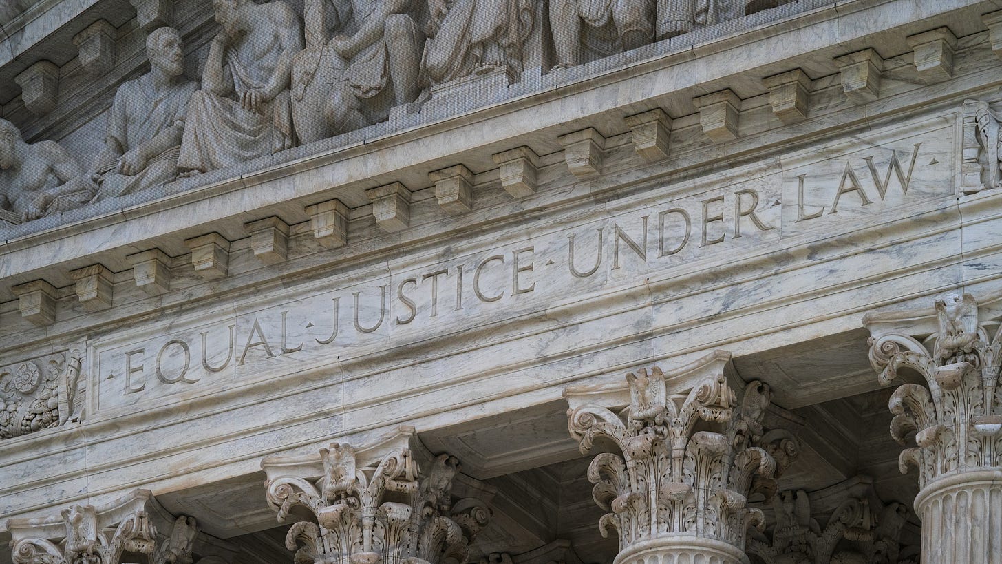 The west front of the Supreme Court building. The carving reads "Equal Justice Under the Law."