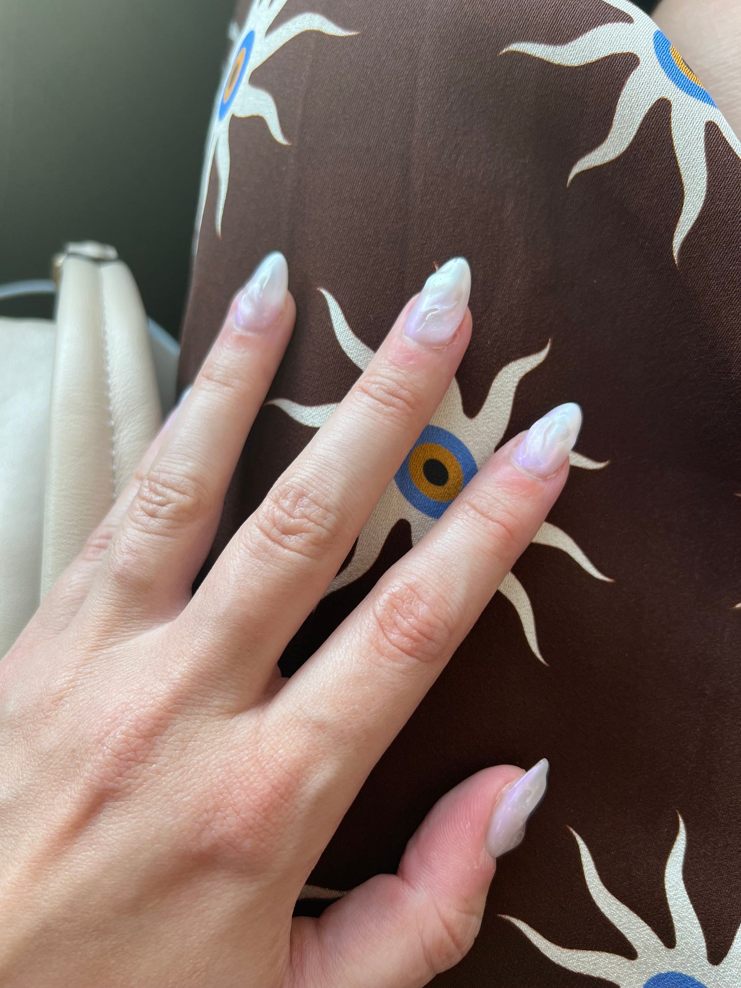 Pearly textured gel manicure.
