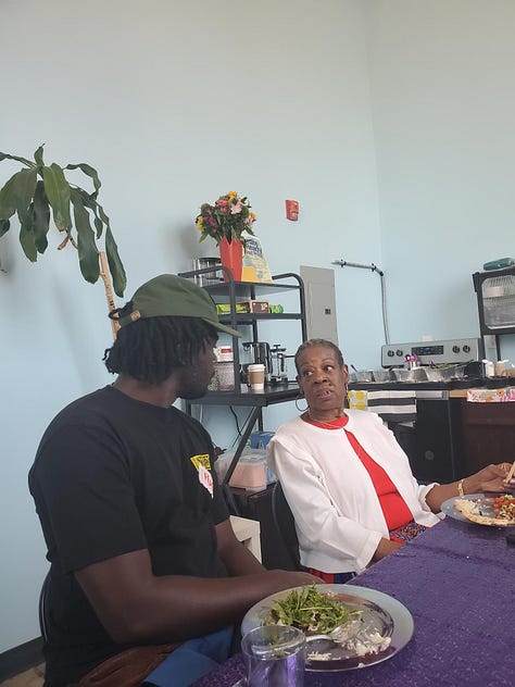 Images from DSM.215's celebration circle, photos of community members sharing food, laughing, and engaging in a gratitude exercise