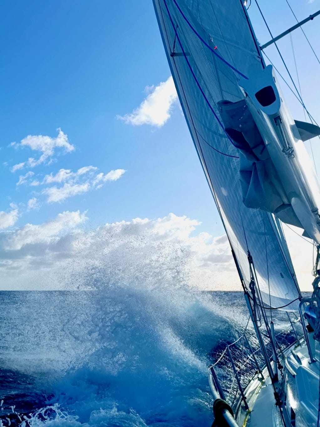 Sailing vesssel Wanderlust is sailing upwind and causing big splashes as the bow penetrates the waves. Sailing vesssel Wanderlust is sailing upwind and causing big splashes as the bow penetrates the waves.