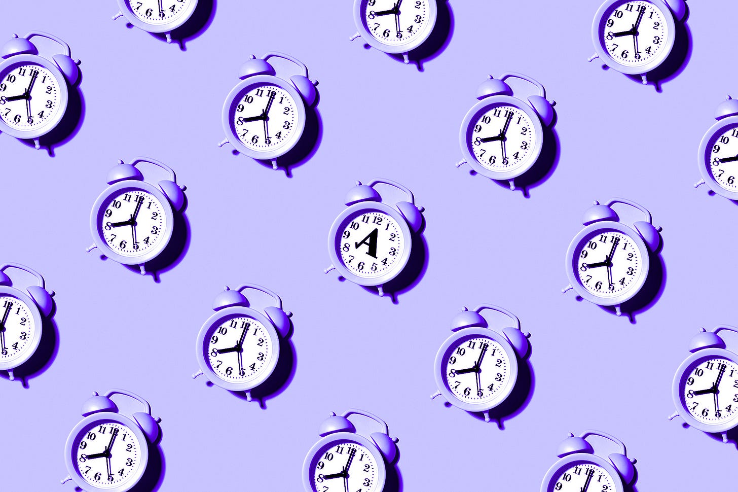 a grid of purple alarm clocks on a purple background