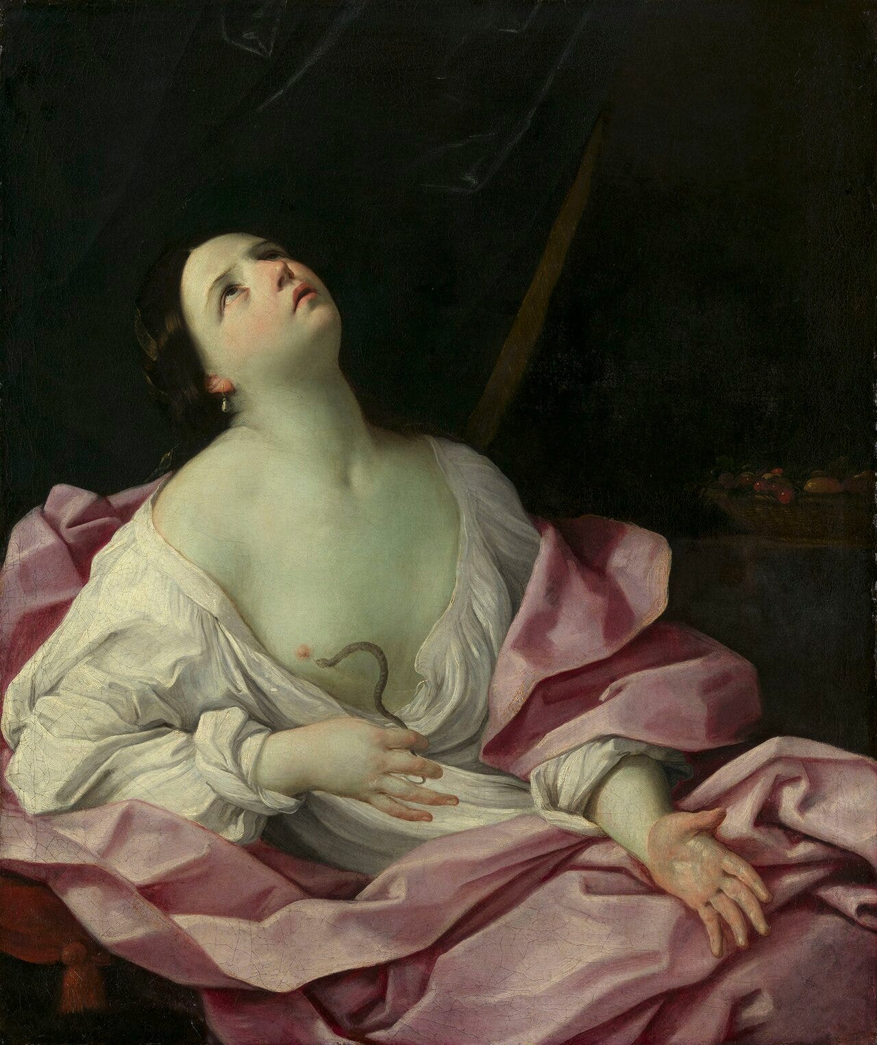 Cleopatra pressing a small asp to her breast, eyes upturned