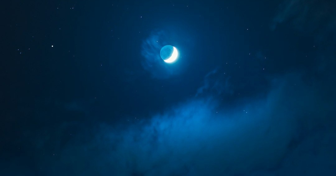 rocky shore under full moon