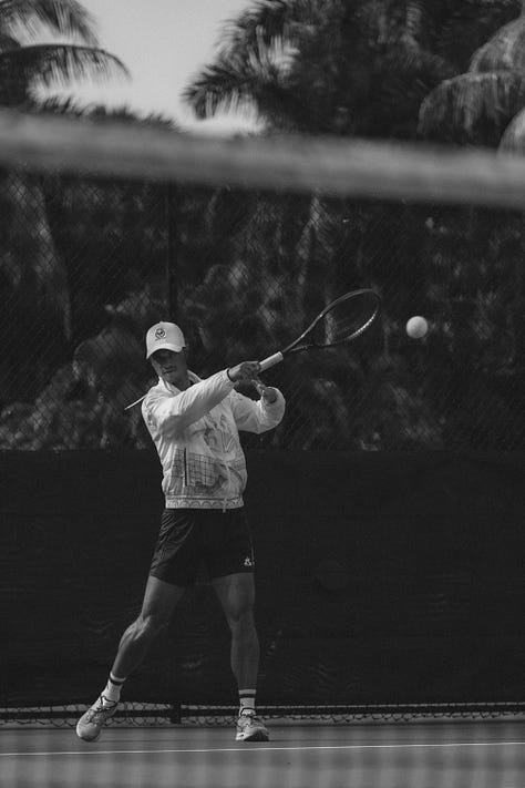 A black and white photo series of men and women playing tennis, modeling Miami Racket Club apparel, and chatting courtside. Mix of action shots, posed portraits, and candid moments, showcasing both athleticism and casual club atmosphere.