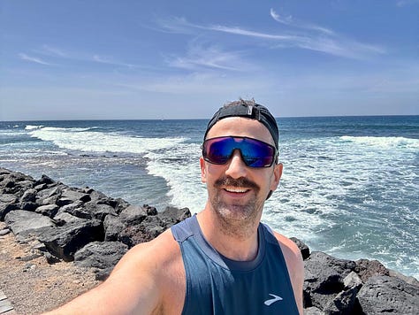 Three running photos from Tenerife, capturing solo runs on the beach.