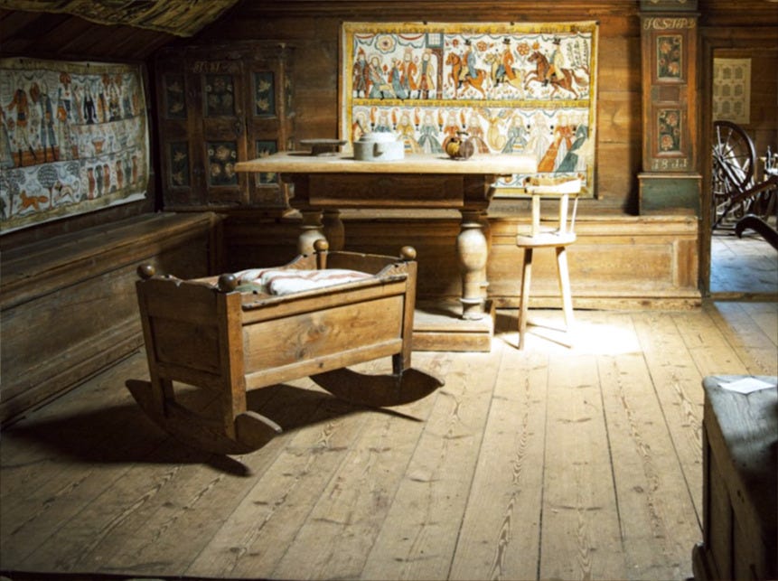 Inside a rustic, wooden room.