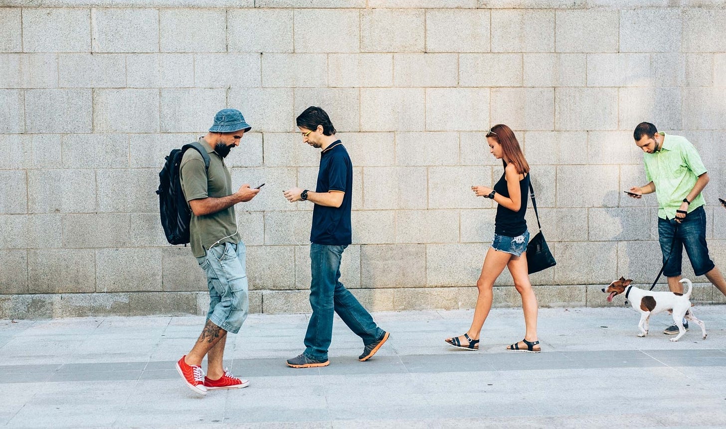 Smartphone zombies backlash: Texting while you walk could soon be ...